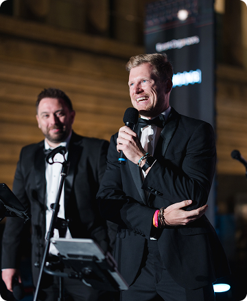 Speaker presenting at an exclusive event