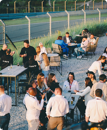 Guests networking at an outdoor event